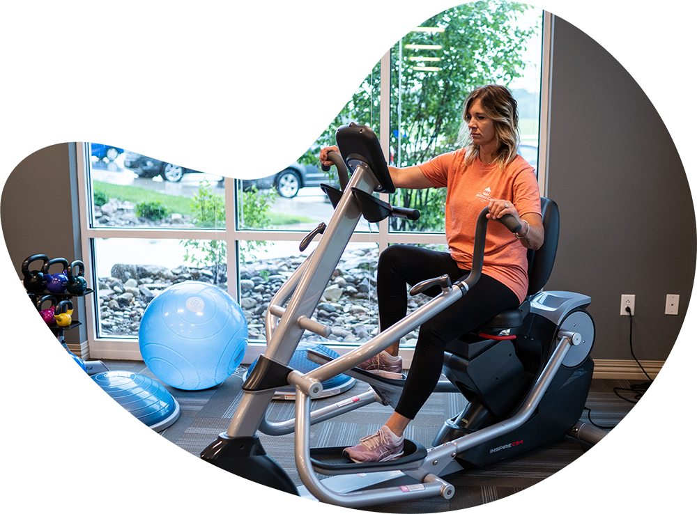 Woman using an exercise machine